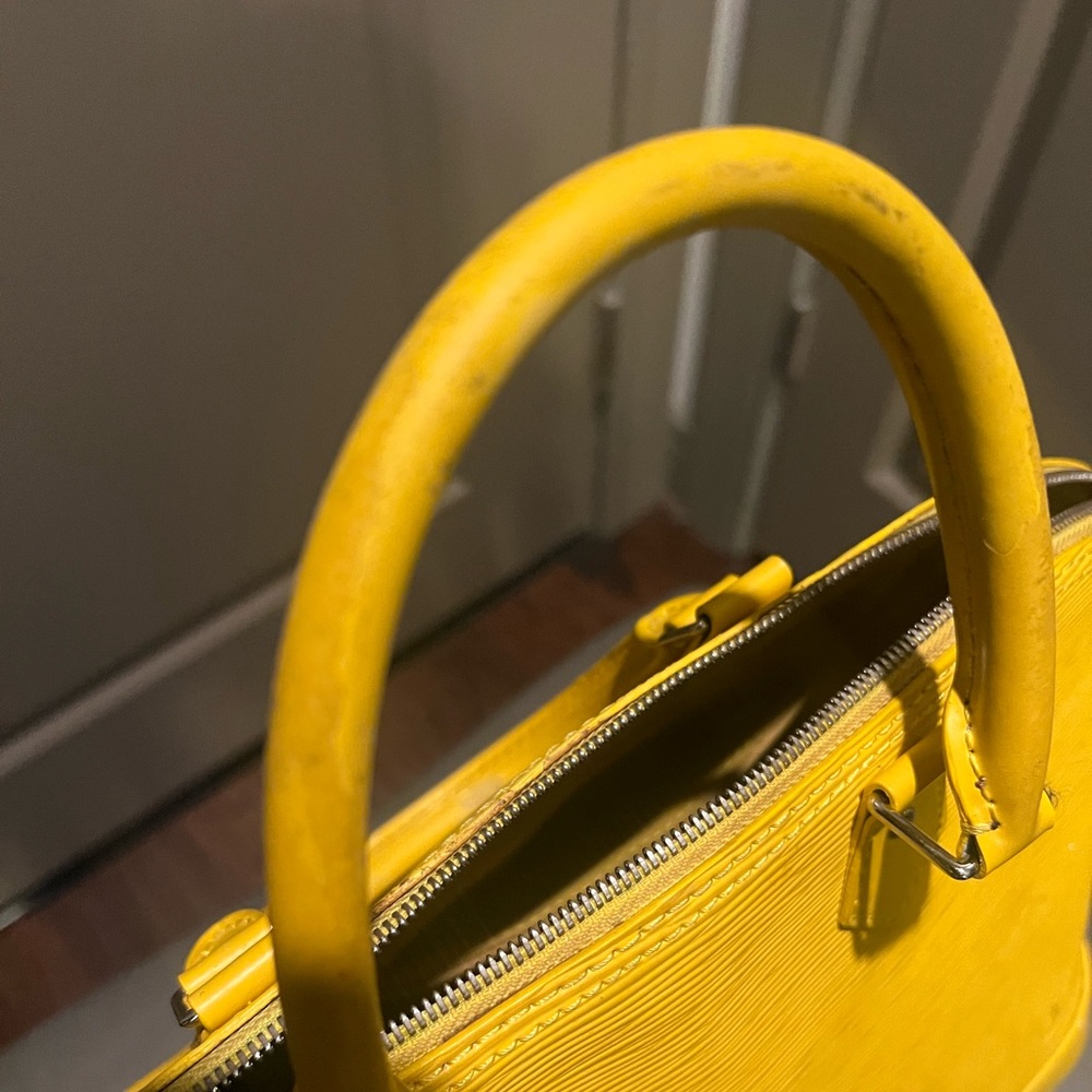 Louis Vuitton Alma Handbag (Yellow)